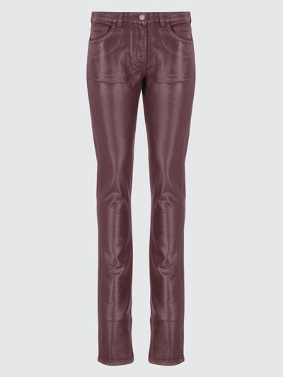 Jeans spalmati effetto pelle