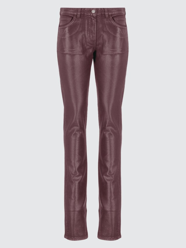 Jeans spalmati effetto pelle