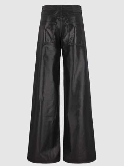 Jeans baggy spalmati effetto pelle