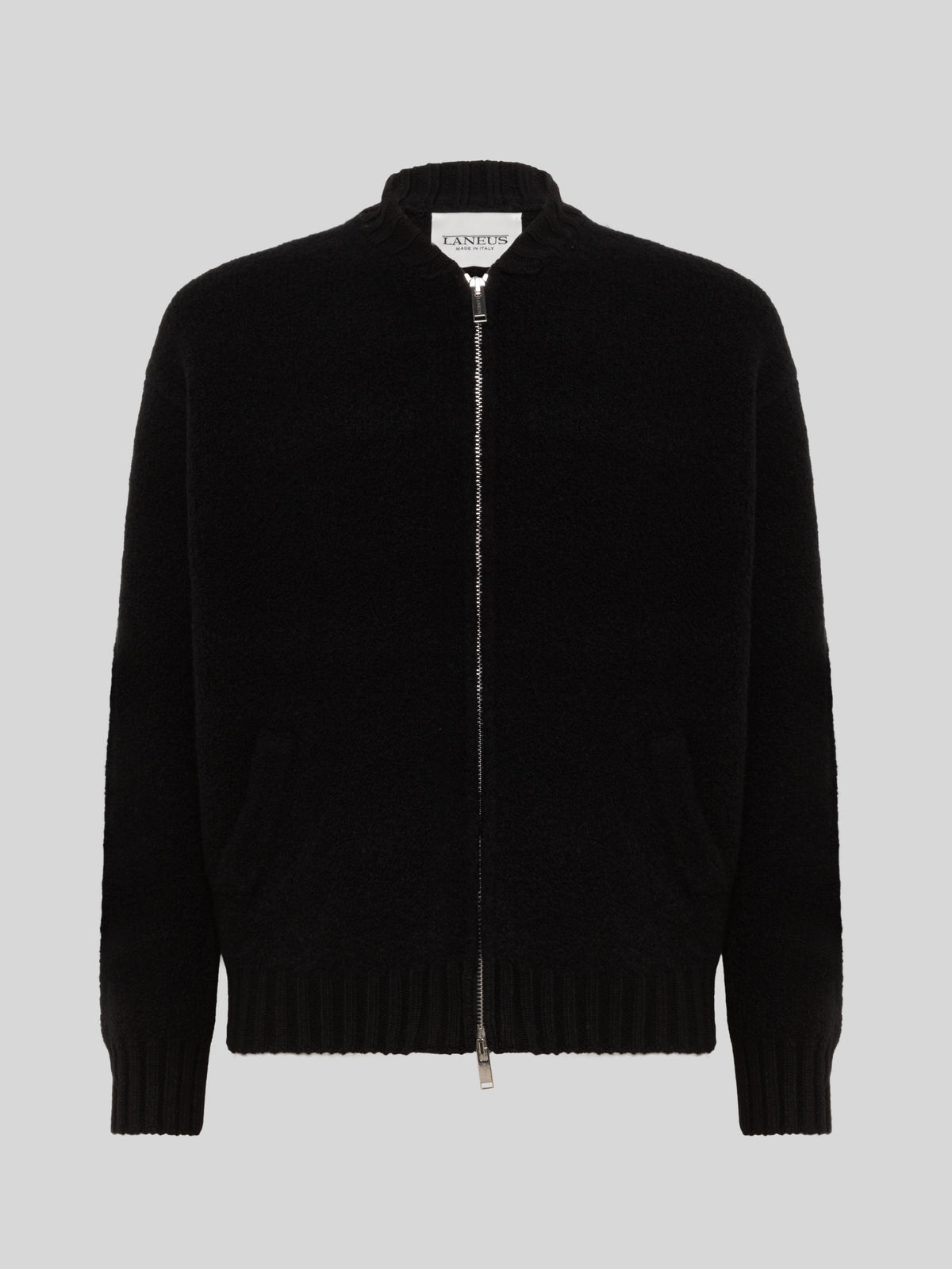 BOMBER JACKET OVER KNITWEAR